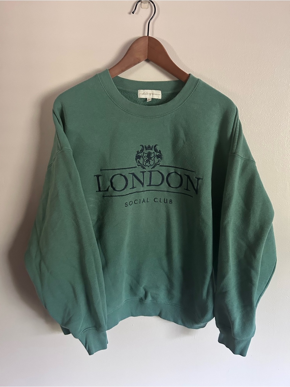 State of Raine | teal embroidered London social club pullover